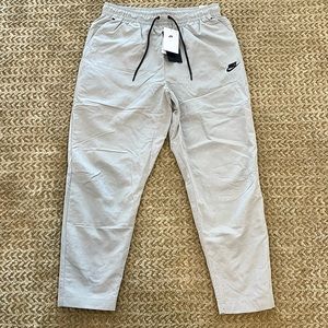 Nike Sportswear Tech Woven Lined Commuter Pants Joggers Sz.L Grey DQ4343-016